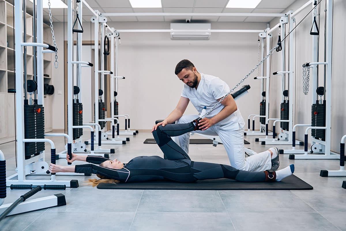 An SJC Physical Therapist Assistant working with a client